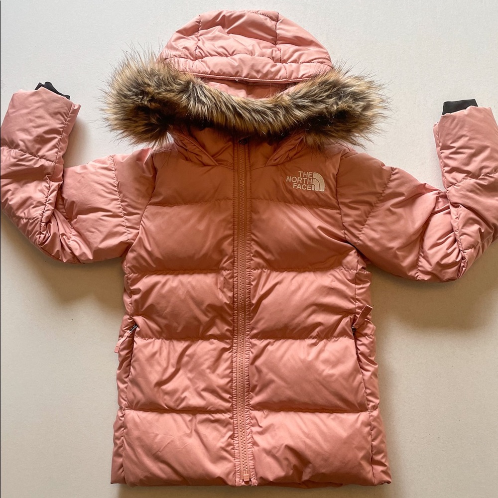 The North Face girls parka in the color, pink clay.